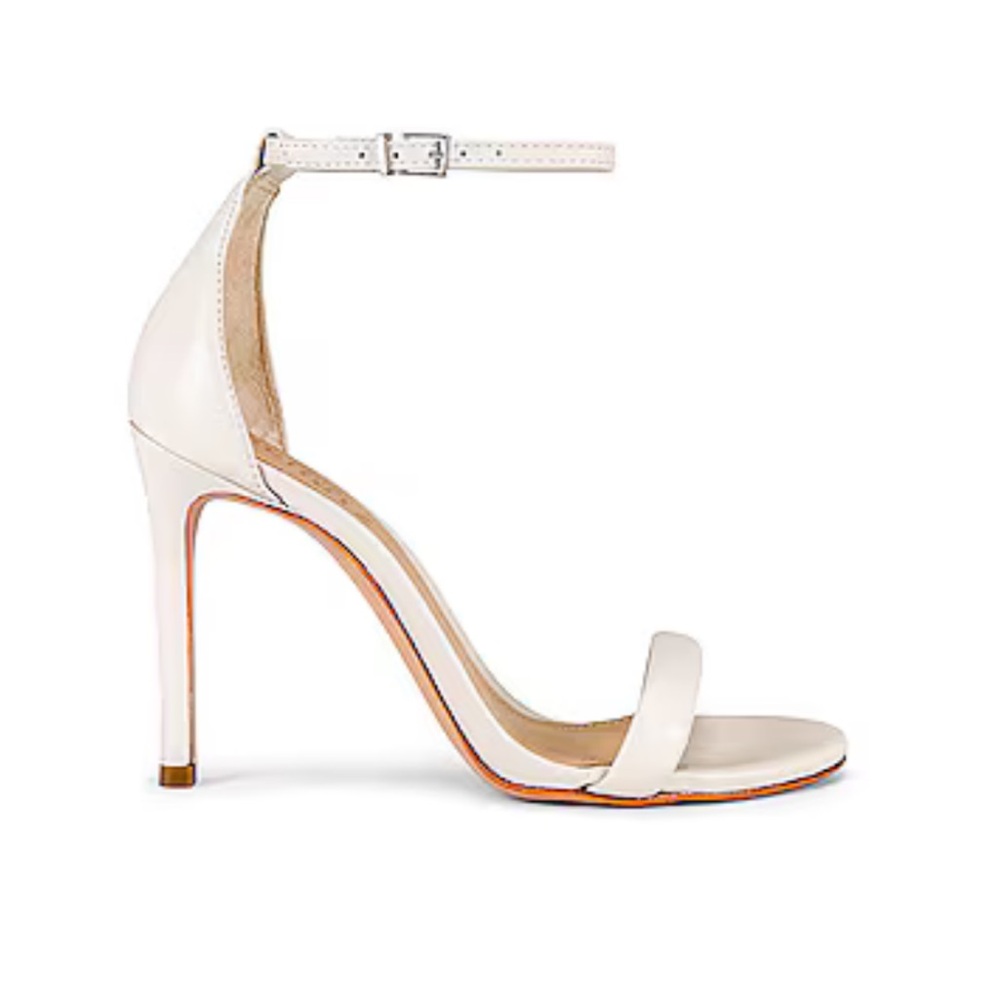 Schutz Cadey Heel in Pearl, size 9.5
Great condition with minor wear